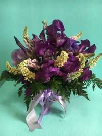 Basket with lupines and garden irises
