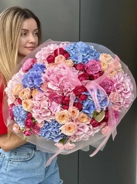 Large bouquet of hydrangeas and spray roses