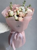 Delicate bouquet with tulips and roses