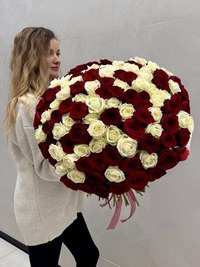 A bouquet of 115 red and white roses